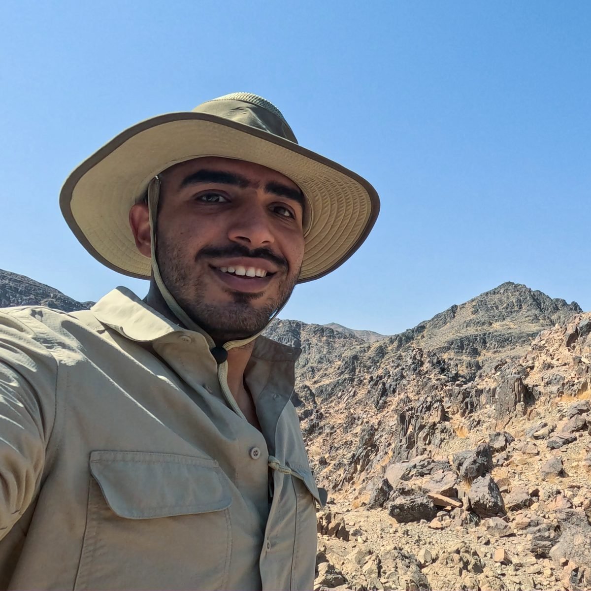 Ibrahim Gaaboub, exploration and database geologist, on a field site in Saudi Arabia